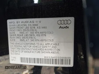2013 Audi Q7 3.0T Premium Plus with VIN WA1LGAFE1DD008439, listed as a IAAI auction lot 41045973 with 100,868 mi miles. Bid and sale history available at carsss.com. Image 9.