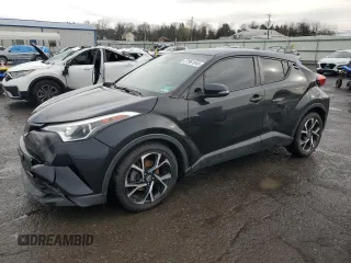 2018 Toyota C-HR XLE z VIN NMTKHMBX1JR031211, wystawiony jako Copart lot #51961045 z przebiegiem 114 140 mil mil oraz Czysty tytuł • Clean title. Historia ofert i sprzedaży dostępna na DreamBid. Obrazek 1.