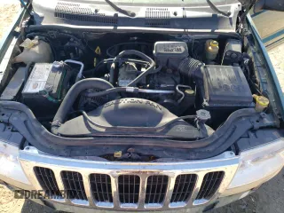 1999 Jeep Grand Cherokee Limited with VIN 1J4GW68SXXC581130, listed as a Copart auction lot 43532245 with 265,886 mi miles and Salvage Title. Bid and sale history available at carsss.com. Image 14.