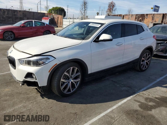 2020 BMW X2 xDrive28i with VIN WBXYJ1C02L5P85780, listed as a Copart auction lot 43665555 with 14,451 mi miles and Salvage Title. Bid and sale history available at carsss.com. Image 1.