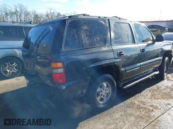 2003 Chevrolet Tahoe LS with VIN 1GNEK13Z13R176465, listed as a IAAI auction lot 41224822 with Not Provided miles and . Bid and sale history available at DreamBid. Image 4.