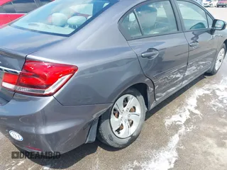 2015 Honda Civic LX with VIN 2HGFB2F59FH561578, listed as a IAAI auction lot 42622451 with 115,387 mi miles and . Bid and sale history available at DreamBid. Image 6.