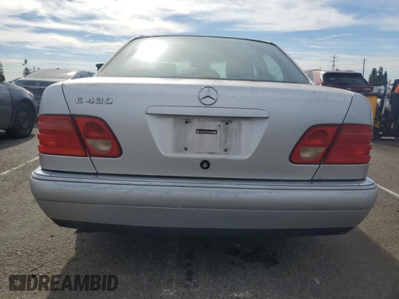 1998 Mercedes-Benz E with VIN WDBJF70F6WA643471, listed as a Copart auction lot 77189934 with 251,579 mi miles and Clean Title. Bid and sale history available at DreamBid. Image 6.