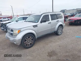 2010 Dodge Nitro SE with VIN 1D4PT2GK8AW144406, listed as a IAAI auction lot 41590691 with 165,959 mi miles and . Bid and sale history available at DreamBid. Image 2.