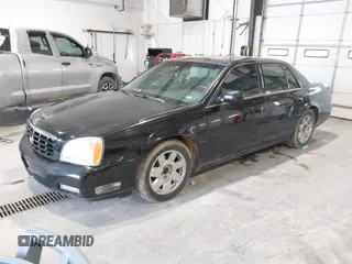 2002 Cadillac DeVille DTS with VIN 1G6KF579X2U141648, listed as a IAAI auction lot 42059624 with 179,338 mi miles. Bid and sale history available at carsss.com. Image 2.