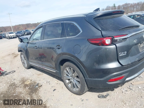 2021 Mazda CX-9 Signature with VIN JM3TCBEY5M0523199, listed as a IAAI auction lot 41916480 with 56,772 mi miles. Bid and sale history available at carsss.com. Image 3.