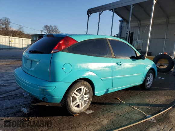 2000 Ford Focus ZX3 with VIN 3FAHP3131YR213601, listed as a Copart auction lot 88597525 with 134,724 mi miles and Salvage title. Bid and sale history available at DreamBid. Image 3.