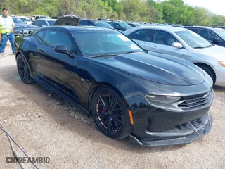 2019 Chevrolet Camaro 1LT with VIN 1G1FB1RX5K0133813, listed as a IAAI auction lot 41927669 with 89,557 mi miles. Bid and sale history available at carsss.com. Image 1.