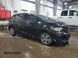 2015 Honda Fit EX-L z VIN 3HGGK5H88FM721318, wystawiony jako Copart lot #56717255 z przebiegiem 107 235 mil mil oraz Szkoda całkowita • Salvage title. Historia ofert i sprzedaży dostępna na DreamBid. Obrazek 4.