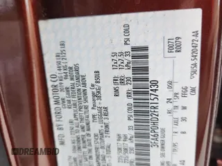 2015 Ford Fusion SE z VIN 3FA6P0HD2FR157430, wystawiony jako Copart lot #64372955 z przebiegiem 152 161 mil mil oraz Szkoda całkowita • Salvage title. Historia ofert i sprzedaży dostępna na DreamBid. Obrazek 12.