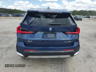 2025 BMW X1 xDrive28i z VIN WBX73EF03S5229226, wystawiony jako Copart lot #55457965 z przebiegiem 2490 mil mil oraz Tytuł czysty. Historia ofert i sprzedaży dostępna na DreamBid. Obrazek 6.