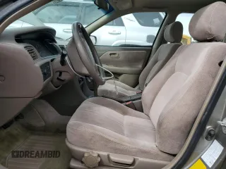 1998 Toyota Camry LE z VIN JT2BG28K7W0215608, wystawiony jako Copart lot #49919085 z przebiegiem 182 353 mil mil oraz Czysty tytuł • Clean title. Historia ofert i sprzedaży dostępna na DreamBid. Obrazek 7.