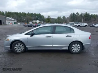 2010 Honda Civic Sdn DX-VP with VIN 2HGFA1F36AH585146, listed as a IAAI auction lot 41944023 with 130,079 mi miles. Bid and sale history available at carsss.com. Image 14.