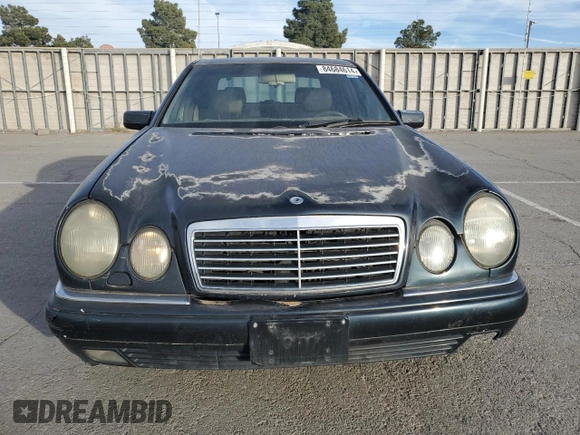 1997 Mercedes-Benz E-Class with VIN WDBJF72F8VA204316, listed as a Copart auction lot 84684614 with 203,748 mi miles and Salvage Title. Bid and sale history available at carsss.com. Image 5.
