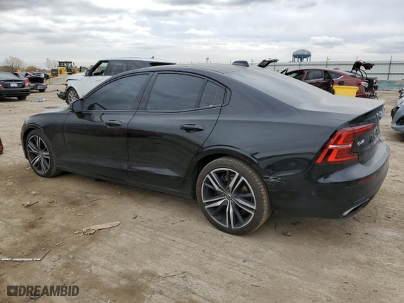 2020 Volvo S60 R-Design with VIN 7JRA22TM6LG038242, listed as a Copart auction lot 77043984 with 103,382 mi miles and Salvage Title. Bid and sale history available at carsss.com. Image 2.