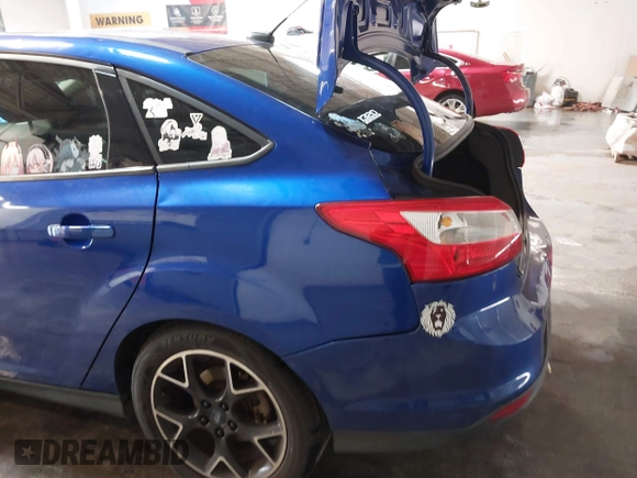 2014 Ford Focus SE with VIN 1FADP3F21EL194900, listed as a IAAI auction lot 41341333 with 103,245 mi miles. Bid and sale history available at carsss.com. Image 6.