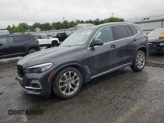 2020 BMW X5 xDrive40i z VIN 5UXCR6C00L9C59994, wystawiony jako Copart lot #58605515 z przebiegiem Nie podano mil oraz Szkoda całkowita • Salvage title. Historia ofert i sprzedaży dostępna na DreamBid. Obrazek 1.
