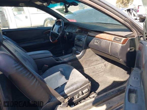 2001 Cadillac Eldorado Touring ETC z VIN 1G6ET12911B103774, wystawiony jako IAAI lot #41998828 z przebiegiem 128 724 mil mil oraz . Historia ofert i sprzedaży dostępna na DreamBid. Obrazek 5.