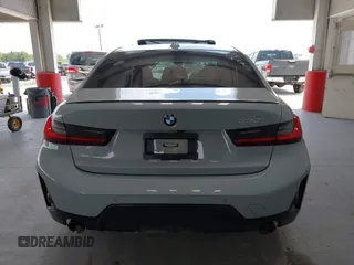 2023 BMW 3 Series 330i with VIN 3MW69FF01P8D33427, listed as a IAAI auction lot 42461734 with 15,587 mi miles and . Bid and sale history available at DreamBid. Image 16.