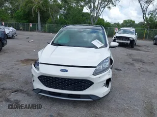 2020 Ford Escape Titanium Hybrid with VIN 1FMCU0DZ3LUC07842, listed as a IAAI auction lot 42456359 with 62,756 mi miles and . Bid and sale history available at DreamBid. Image 6.