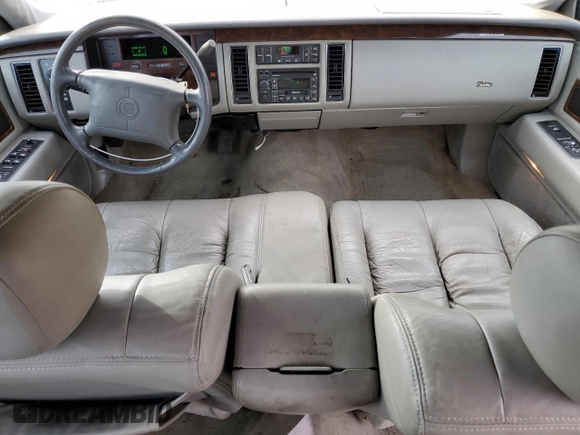 1996 Cadillac Fleetwood z VIN 1G6DW52P6TR702611, wystawiony jako Copart lot #77202664 z przebiegiem 159 994 mil mil oraz Szkody całkowita. Historia ofert i sprzedaży dostępna na DreamBid. Obrazek 8.
