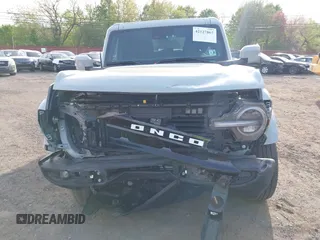 2023 Ford Bronco with VIN 1FMDE5BH3PLA90591, listed as a IAAI auction lot 42127867 with 34,616 mi miles and . Bid and sale history available at DreamBid. Image 6.