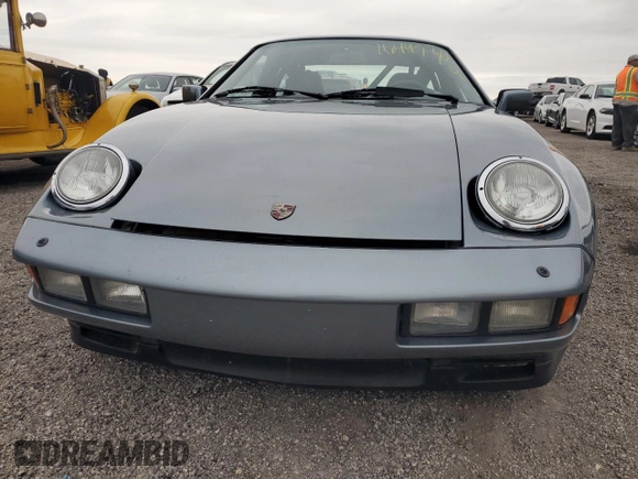 1983 Porsche 928 z VIN WP0ZZZ92ZDS841622, wystawiony jako Copart lot #76995304 z przebiegiem 83 862 mil mil oraz Szkody całkowita. Historia ofert i sprzedaży dostępna na DreamBid. Obrazek 5.