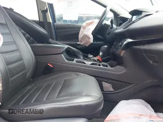 2017 Ford Escape Titanium with VIN 1FMCU0JD3HUE35131, listed as a IAAI auction lot 42062019 with 108,470 mi miles and . Bid and sale history available at DreamBid. Image 5.