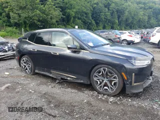 2023 BMW iX xDrive50 with VIN WB523CF05PCL62449, listed as a Copart auction lot 57069783 with 0 mi miles. Bid and sale history available at carsss.com. Image 4.