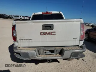 2017 GMC Canyon 4WD SLT with VIN 1GTP6DE18H1301885, listed as a Copart auction lot 77217864 with 119,413 mi miles and Salvage Title. Bid and sale history available at carsss.com. Image 6.