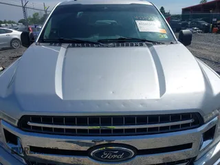 2019 Ford F-150 XL with VIN 1FTEW1EP3KFB61412, listed as a IAAI auction lot 42242393 with 117,503 mi miles and . Bid and sale history available at DreamBid. Image 18.