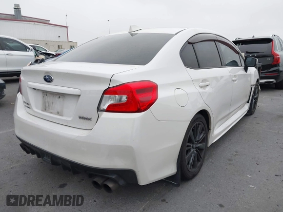 2015 Subaru WRX with VIN JF1VA1A66F9808200, listed as a IAAI auction lot 42141030 with 84,380 mi miles and . Bid and sale history available at DreamBid. Image 4.