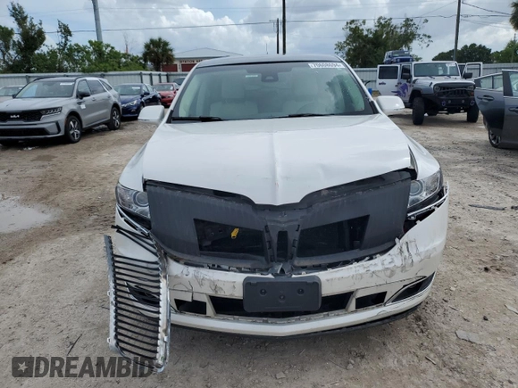 2014 Lincoln MKT with VIN 2LMHJ5FK5EBL57377, listed as a Copart auction lot 70608694 with 115,053 mi miles and Salvage Title. Bid and sale history available at DreamBid. Image 5.
