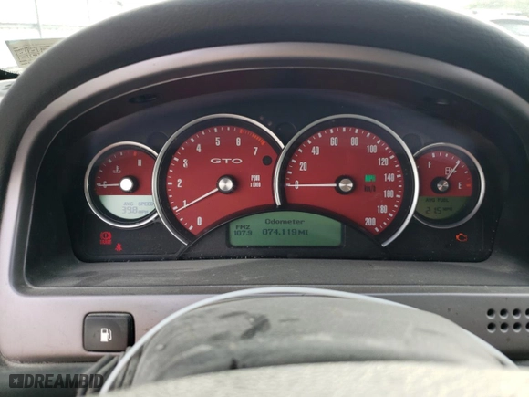 2004 Pontiac GTO with VIN 6G2VX12G64L299636, listed as a Copart auction lot 73538864 with 74,119 mi miles and Salvage Title. Bid and sale history available at carsss.com. Image 9.