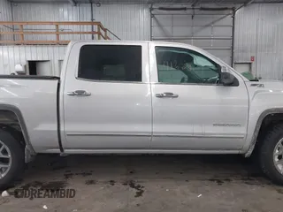 2015 GMC Sierra 1500 SLT with VIN 3GTU2VEC1FG519042, listed as a IAAI auction lot 41629031 with 163,856 mi miles and . Bid and sale history available at DreamBid. Image 13.
