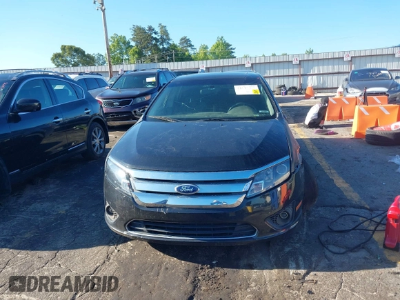 2012 Ford Fusion SE z VIN 3FAHP0HA5CR347636, wystawiony jako IAAI lot #42184462 z przebiegiem 211 804 mil mil oraz . Historia ofert i sprzedaży dostępna na DreamBid. Obrazek 12.