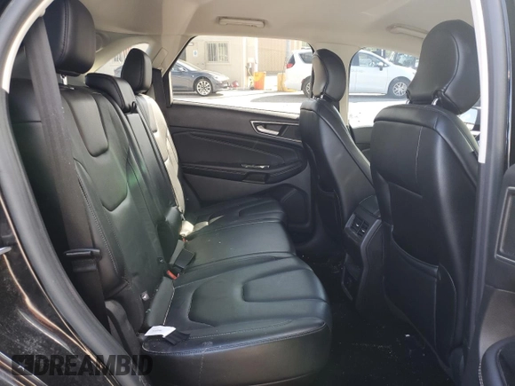 2015 Ford Edge Titanium z VIN 2FMTK4K88FBB56310, wystawiony jako Copart lot #53851524 z przebiegiem 170 380 mil mil oraz Szkody całkowita. Historia ofert i sprzedaży dostępna na DreamBid. Obrazek 11.