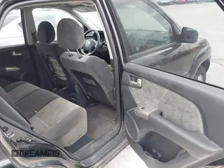 2007 Kia Sportage LX with VIN KNDJE723077397667, listed as a IAAI auction lot 42011122 with 218,744 mi miles and . Bid and sale history available at carsss.com. Image 8.