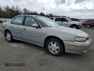 1999 Oldsmobile Cutlass GLS z VIN 1G3NG52J3X6333871, wystawiony jako Copart lot #73892304 z przebiegiem 44 280 mil mil oraz Tytuł czysty. Historia ofert i sprzedaży dostępna na DreamBid. Obrazek 4.