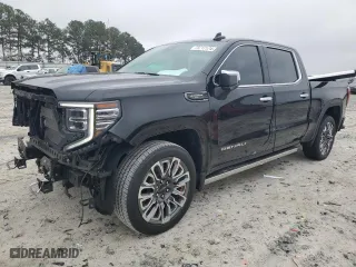 2023 GMC Sierra 1500 Denali Ultimate with VIN 1GTUUHEL1PZ119317, listed as a Copart auction lot 79717174 with 28,667 mi miles and Salvage Title. Bid and sale history available at carsss.com. Image 1.