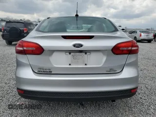 2016 Ford Focus SE с VIN 1FADP3F27GL358413, выставлен на аукционе Copart как лот 52295805 с пробегом 123 507 миль миль и Списание • Salvage title. История ставок и продаж доступна на DreamBid. Изображение 6.