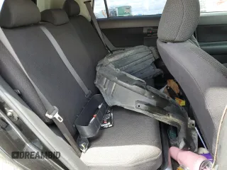 2008 Scion xB z VIN JTLKE50E281050489, wystawiony jako Copart lot #56972525 z przebiegiem 214 805 mil mil oraz Szkody całkowita. Historia ofert i sprzedaży dostępna na DreamBid. Obrazek 11.