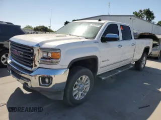 2015 GMC Sierra 2500HD SLT z VIN 1GT12ZE86FF195559, wystawiony jako Copart lot #56325105 z przebiegiem 186 560 mil mil oraz Szkoda całkowita • Salvage title. Historia ofert i sprzedaży dostępna na DreamBid. Obrazek 1.