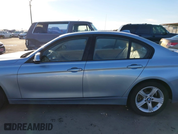 2013 BMW 3 Series 320i with VIN WBA3B1C56DK128089, listed as a IAAI auction lot 41332091 with 101,155 mi miles. Bid and sale history available at carsss.com. Image 13.