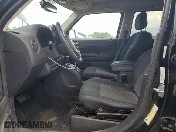 2014 Jeep Patriot Sport with VIN 1C4NJPBA1ED502288, listed as a Copart auction lot 62825715 with 87,567 mi miles and Salvage title. Bid and sale history available at DreamBid. Image 7.