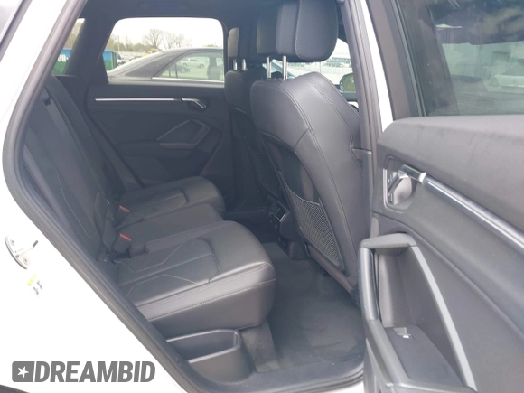 2022 Audi Q3 S line Premium Plus z VIN WA1EECF31N1148535, wystawiony jako IAAI lot #41947659 z przebiegiem 31 880 mil mil oraz . Historia ofert i sprzedaży dostępna na DreamBid. Obrazek 8.