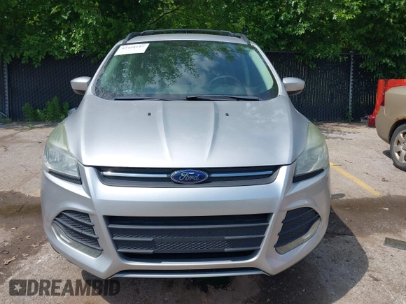 2013 Ford Escape SE z VIN 1FMCU0GXXDUC92917, wystawiony jako IAAI lot #42458117 z przebiegiem 136 006 mil mil oraz . Historia ofert i sprzedaży dostępna na DreamBid. Obrazek 6.