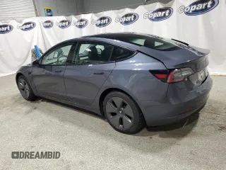 2022 Tesla Model 3 with VIN 5YJ3E1EA8NF287506, listed as a Copart auction lot 55674145 with 106,745 mi miles and Clean Title. Bid and sale history available at DreamBid. Image 2.