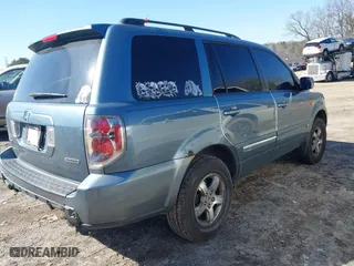 2006 Honda Pilot EX with VIN 2HKYF18456H516414, listed as a IAAI auction lot 41784477 with 241,735 mi miles. Bid and sale history available at carsss.com. Image 4.