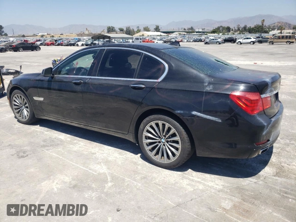 2012 BMW 7 Series 740i with VIN WBAKA4C59CDS99342, listed as a Copart auction lot 63705894 with 0 mi miles and Salvage Title. Bid and sale history available at carsss.com. Image 2.